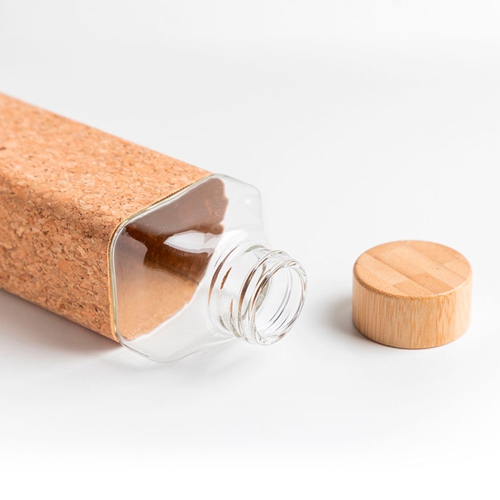GLASS BOTTLE WITH CORK SLEEVE